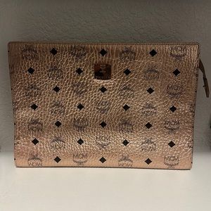 MCM rose gold clutch
